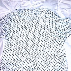white and black designed blouse